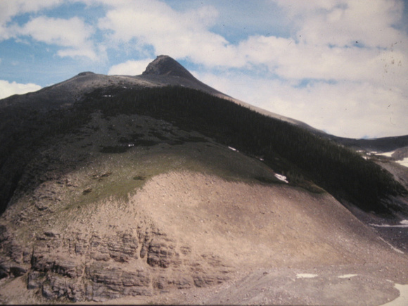 Dave's pic of end of ridge in summer 1976. We carried skis -angled left above rock- then up ridge.