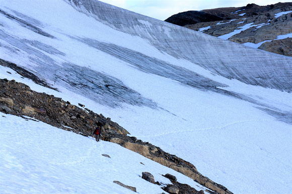 Snow to glacier. Those without crampons went down and around.