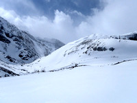 Two pic pano from 1st bench on moraine route to Peyto. Canyon to left.