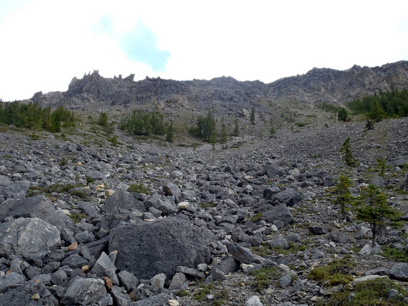 Lower slopes of NW ridge are baked hard with terrible gravel on them.