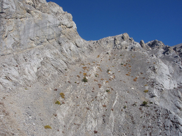 Big ramp - we travelled along the base of the rock slabs and then around the corner. Up 20-30 feet up the slabs and along a ledge which lead to the bottom of a LH scree gully/ramp which lead up to the
