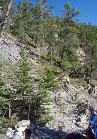 One hour, 5-6 creek crossing - cairn and trail on left.Just past start of ridge on left and found trail. iew North in next pic.