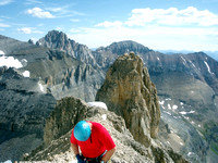 Kevin - top of couloir. Tower behind - Gary and I climbed in 2006 from col. Great bivy on top.