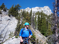 Should put away rope for another 300+mscramble/hike treed ridge, scree and small rockbands for 300 m and 1 hour.