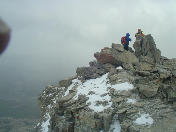 Bob and I try to get shelter at summit.