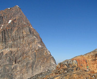 The ridge has two steeper steps. The lower angle sections have the small snow drifts/patches on the right side.