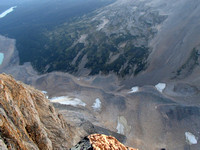 Trail comes off first switch and in gully beside moraine and past two snow patches.