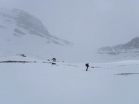 Kevin approaches weather station buildings - I went too high - could have contoured lower and saved 30 m elv.